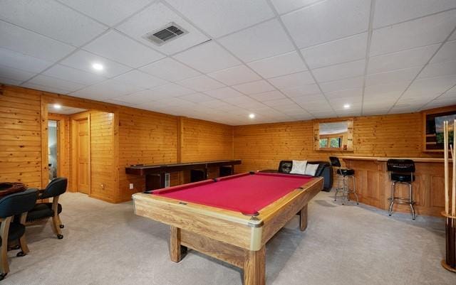 playroom with light carpet, wooden walls, billiards, and a paneled ceiling