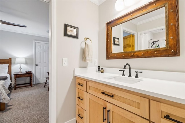 bathroom featuring vanity and ornamental molding