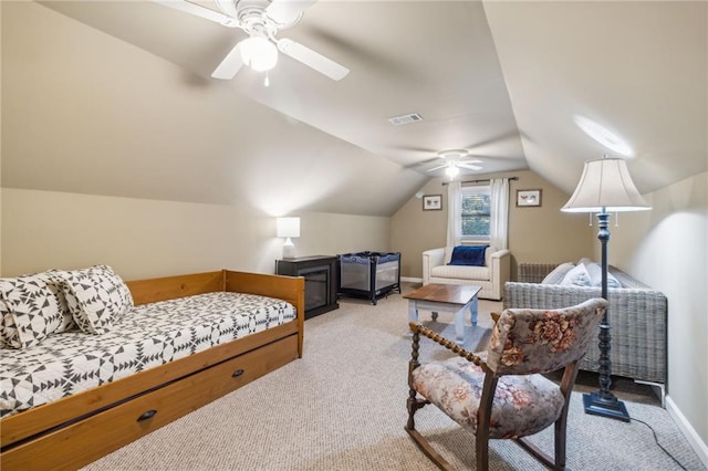 bedroom featuring lofted ceiling, ceiling fan, and carpet floors