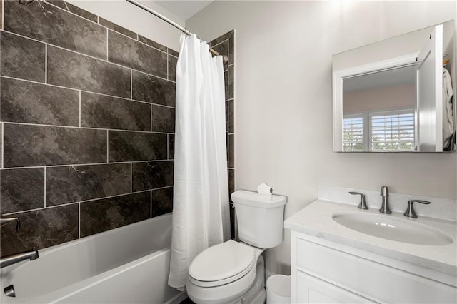 full bath featuring vanity, toilet, and shower / bath combo with shower curtain