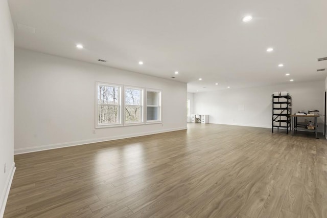 828 Chestnut Pl, Milton, GA 30004 - unfurnished living room with wood finished floors, recessed lighting, and baseboards