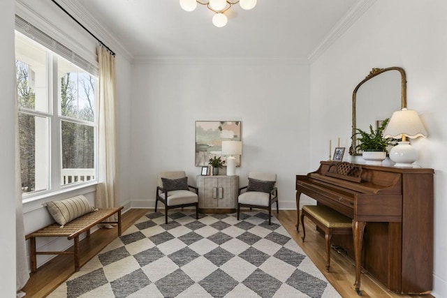 828 Chestnut Pl, Milton, GA 30004 - living area featuring ornamental molding, light wood-style floors, baseboards, and a chandelier