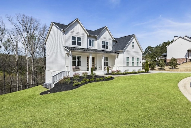 828 Chestnut Pl, Milton, GA 30004 - modern farmhouse style home with covered porch, board and batten siding, a standing seam roof, and a front yard