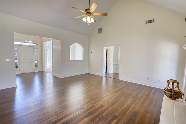 unfurnished living room with baseboards, wood finished floors, visible vents, and ceiling fan