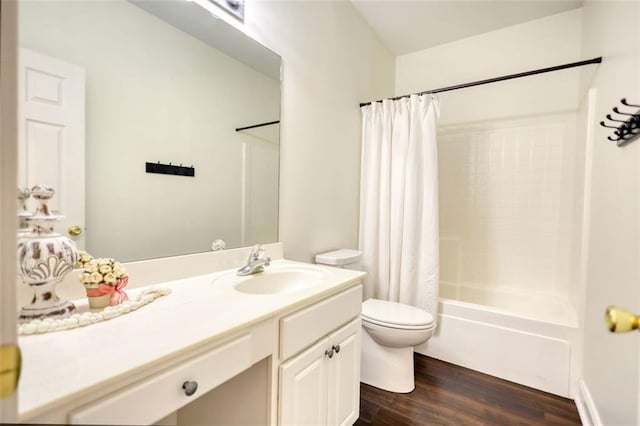 full bath featuring vanity, shower / bathtub combination with curtain, toilet, and wood finished floors