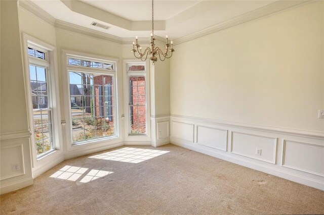 unfurnished dining area with visible vents, light carpet, a raised ceiling, and an inviting chandelier