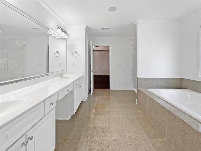 bathroom featuring plus walk in shower and vanity