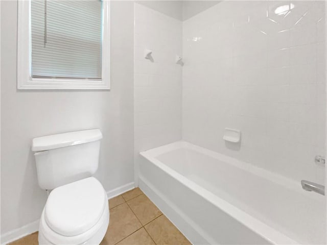 bathroom featuring shower / bath combination, toilet, and tile patterned flooring