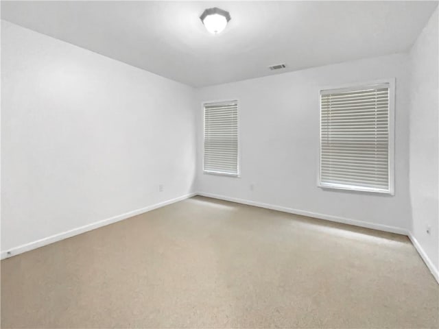 view of carpeted spare room