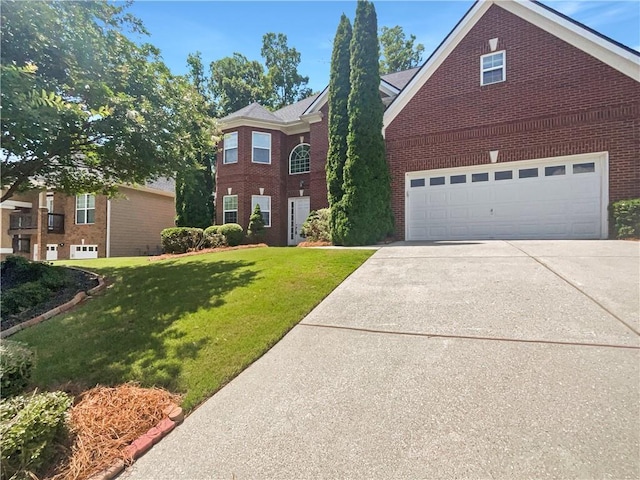 view of front of home featuring a front lawn and a garage