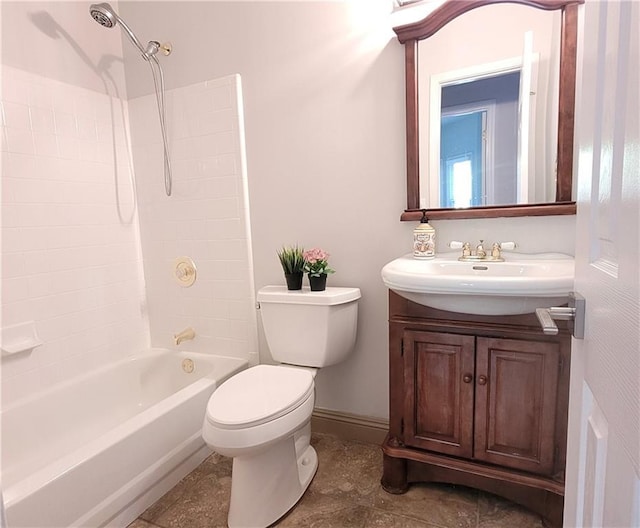 full bathroom with vanity, toilet, and washtub / shower combination