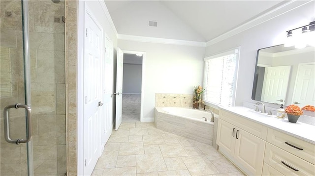 bathroom featuring vanity, vaulted ceiling, ornamental molding, and shower with separate bathtub