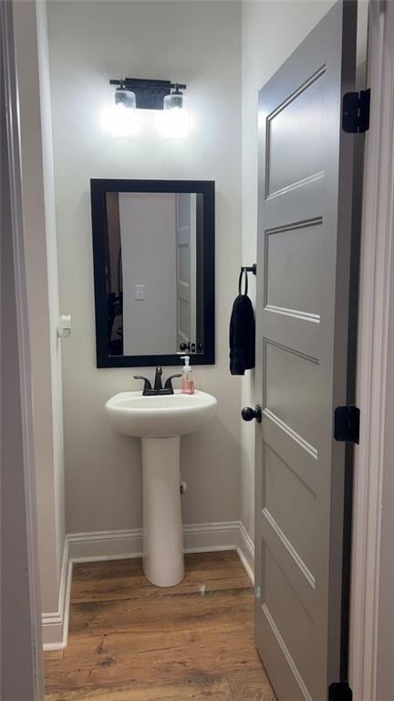 224 Crest Creek Way, Villa Rica, GA 30180 - bathroom with wood finished floors and baseboards
