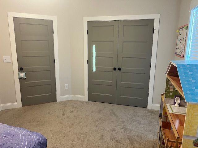 224 Crest Creek Way, Villa Rica, GA 30180 - carpeted entrance foyer featuring baseboards