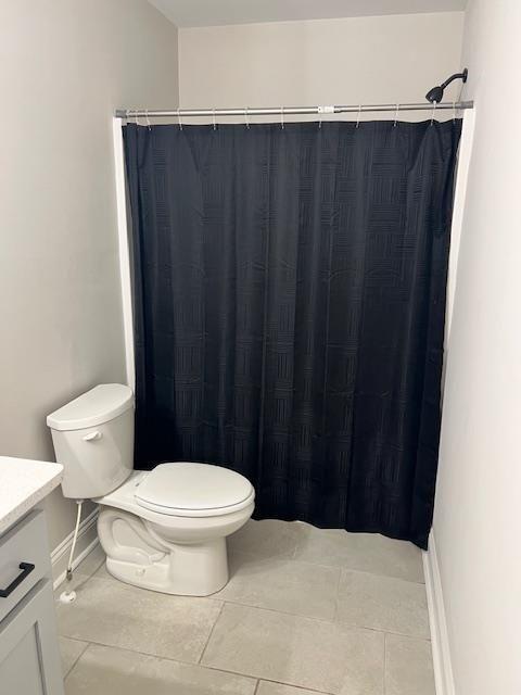 224 Crest Creek Way, Villa Rica, GA 30180 - full bathroom with vanity, tile patterned floors, and a shower with shower curtain
