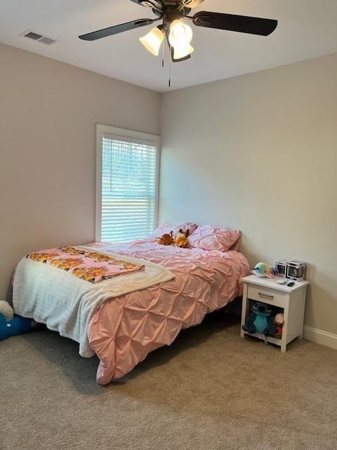 224 Crest Creek Way, Villa Rica, GA 30180 - bedroom featuring light colored carpet and ceiling fan