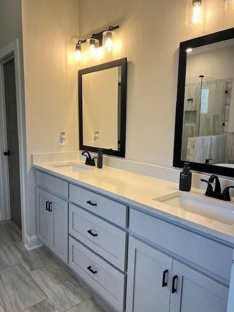 224 Crest Creek Way, Villa Rica, GA 30180 - full bath with double vanity and a tile shower