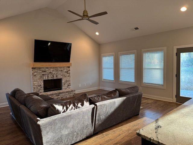 224 Crest Creek Way, Villa Rica, GA 30180 - living area with wood finished floors, ceiling fan, healthy amount of natural light, recessed lighting, and a fireplace