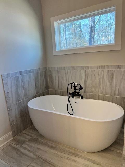 224 Crest Creek Way, Villa Rica, GA 30180 - full bath featuring a freestanding bath and tile walls