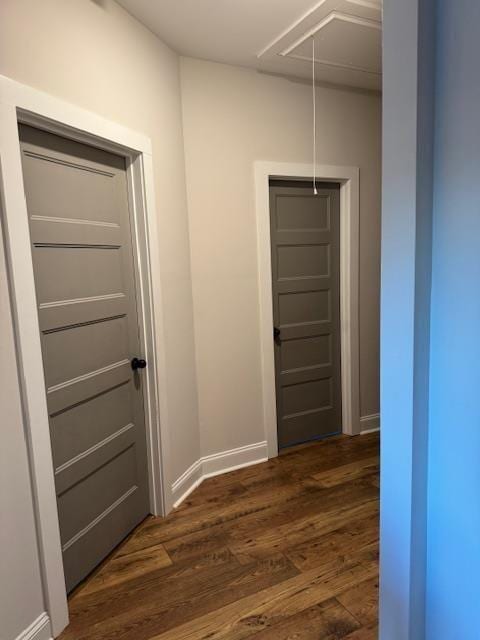 224 Crest Creek Way, Villa Rica, GA 30180 - corridor featuring attic access and dark wood-style floors