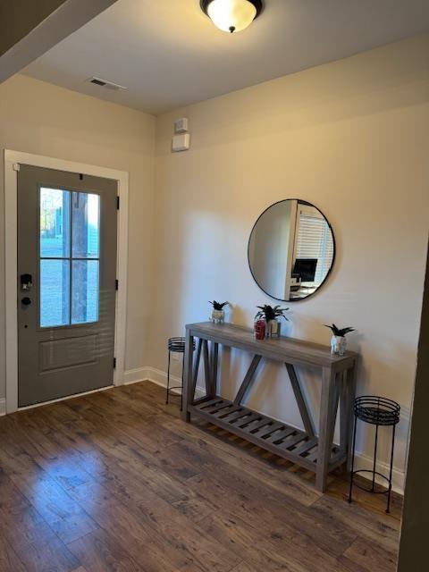 224 Crest Creek Way, Villa Rica, GA 30180 - entryway with baseboards and wood finished floors