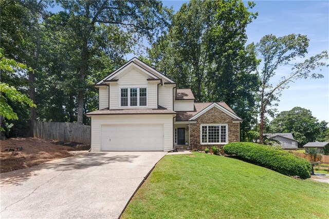 4816 Morning Chase NW, Acworth, GA 30102 - traditional home featuring a garage, driveway, and stone siding