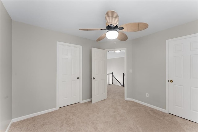 4816 Morning Chase NW, Acworth, GA 30102 - unfurnished bedroom featuring light colored carpet and a ceiling fan