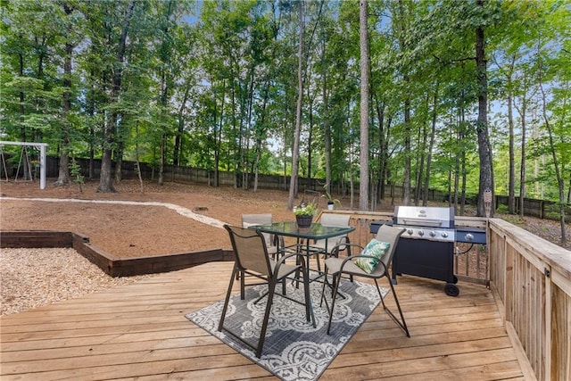 4816 Morning Chase NW, Acworth, GA 30102 - wooden terrace featuring a fenced backyard, view of wooded area, and outdoor dining space