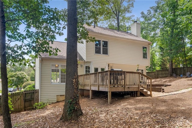4816 Morning Chase NW, Acworth, GA 30102 - rear view of house featuring a deck, a fenced backyard, a chimney, crawl space, and a shingled roof