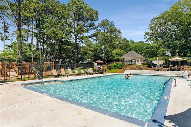 4816 Morning Chase NW, Acworth, GA 30102 - community pool with a patio area and view of scattered trees