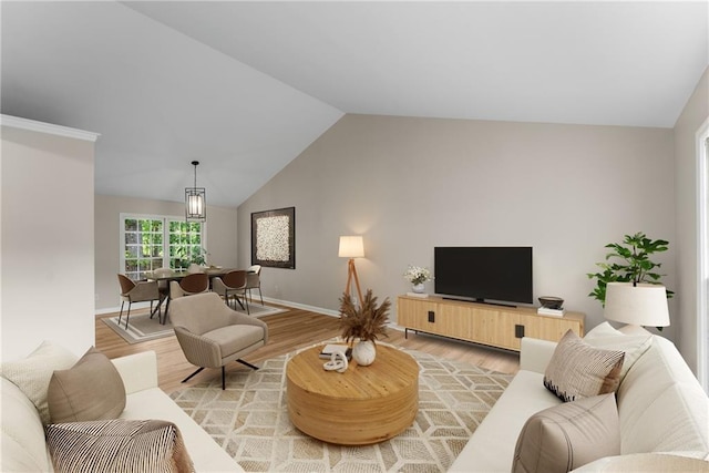 4816 Morning Chase NW, Acworth, GA 30102 - living area featuring light wood finished floors and vaulted ceiling