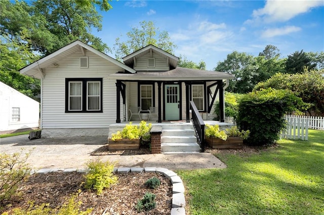 bungalow featuring covered porch
