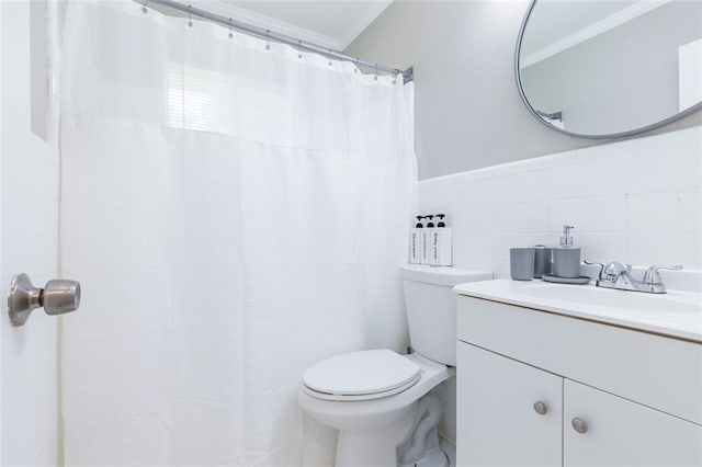 full bath with tile walls, toilet, ornamental molding, a shower with curtain, and vanity