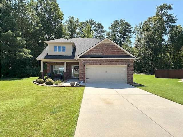 craftsman-style home with covered porch, a front lawn, and a garage