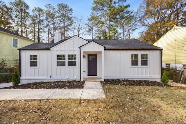 view of front of home with a front yard