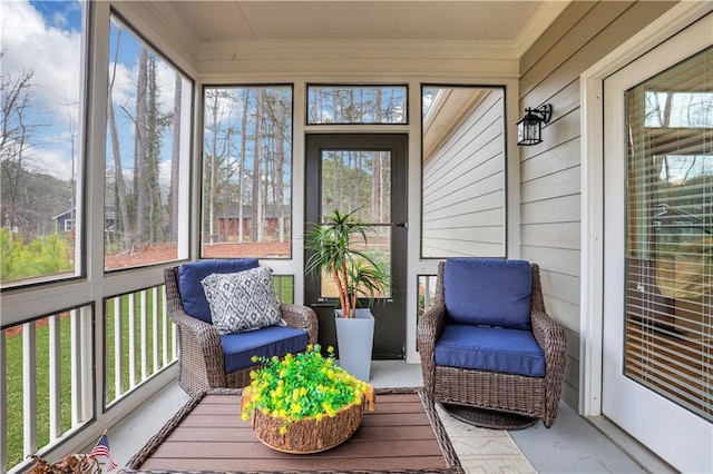 sunroom / solarium featuring plenty of natural light