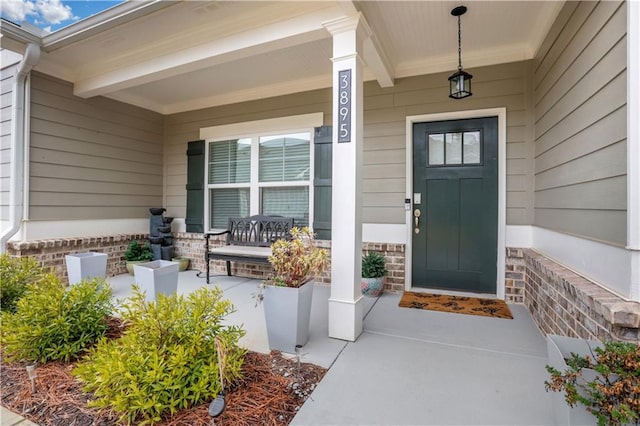 property entrance with a porch