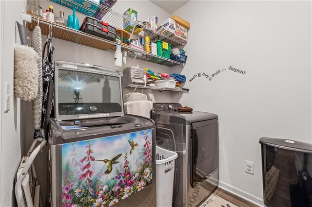 101 Marion Dr, Cartersville, GA 30120 - laundry room with washer and clothes dryer and baseboards