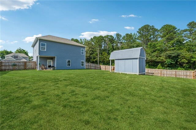 101 Marion Dr, Cartersville, GA 30120 - fenced backyard featuring a shed