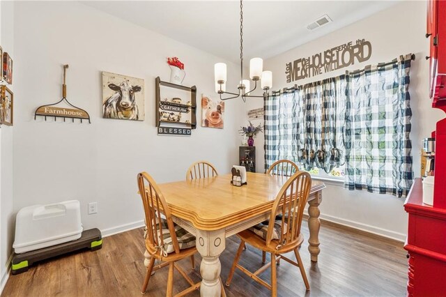 101 Marion Dr, Cartersville, GA 30120 - dining room with a chandelier and wood finished floors