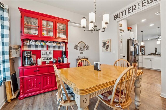101 Marion Dr, Cartersville, GA 30120 - dining room with a chandelier, wood finished floors, and recessed lighting