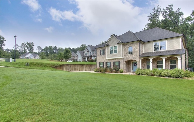 116 Chorley Run, Ellenwood, GA 30294 - view of front facade with a front lawn and brick siding