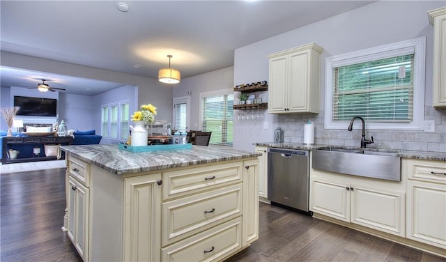 116 Chorley Run, Ellenwood, GA 30294 - kitchen featuring stainless steel dishwasher, light stone countertops, tasteful backsplash, ceiling fan, and dark wood-style floors
