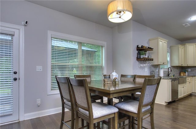 116 Chorley Run, Ellenwood, GA 30294 - dining area featuring dark wood finished floors and baseboards