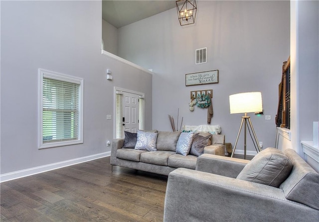 116 Chorley Run, Ellenwood, GA 30294 - living area with a high ceiling and dark wood-style floors