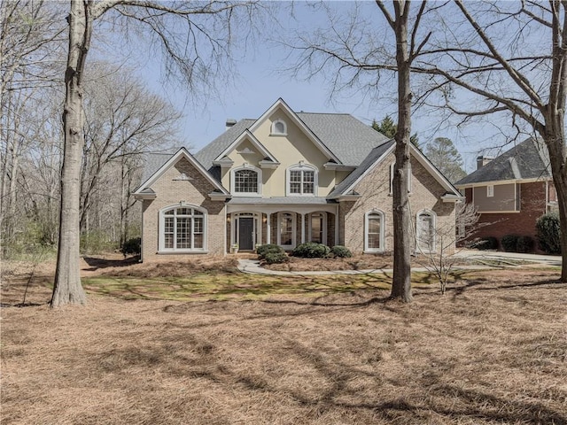 view of front facade featuring brick siding