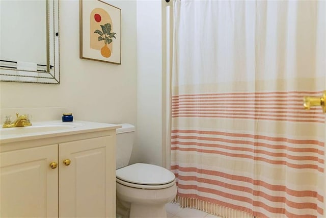 bathroom with tile patterned floors, toilet, a shower with shower curtain, and vanity