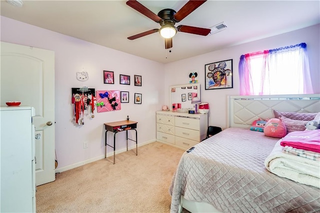1574 Leonard St, Hampton, GA 30228 - bedroom with light colored carpet and a ceiling fan