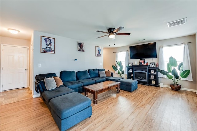1574 Leonard St, Hampton, GA 30228 - living area featuring ceiling fan and light wood-type flooring