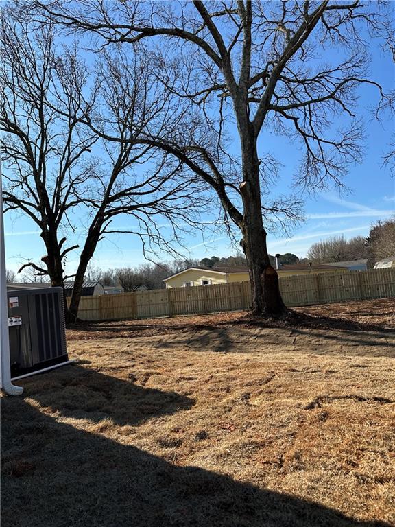 view of yard with fence